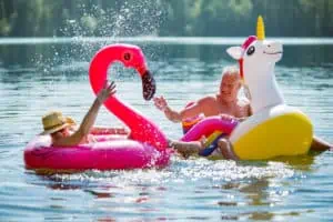 Elderly couple splashes in Florida spring